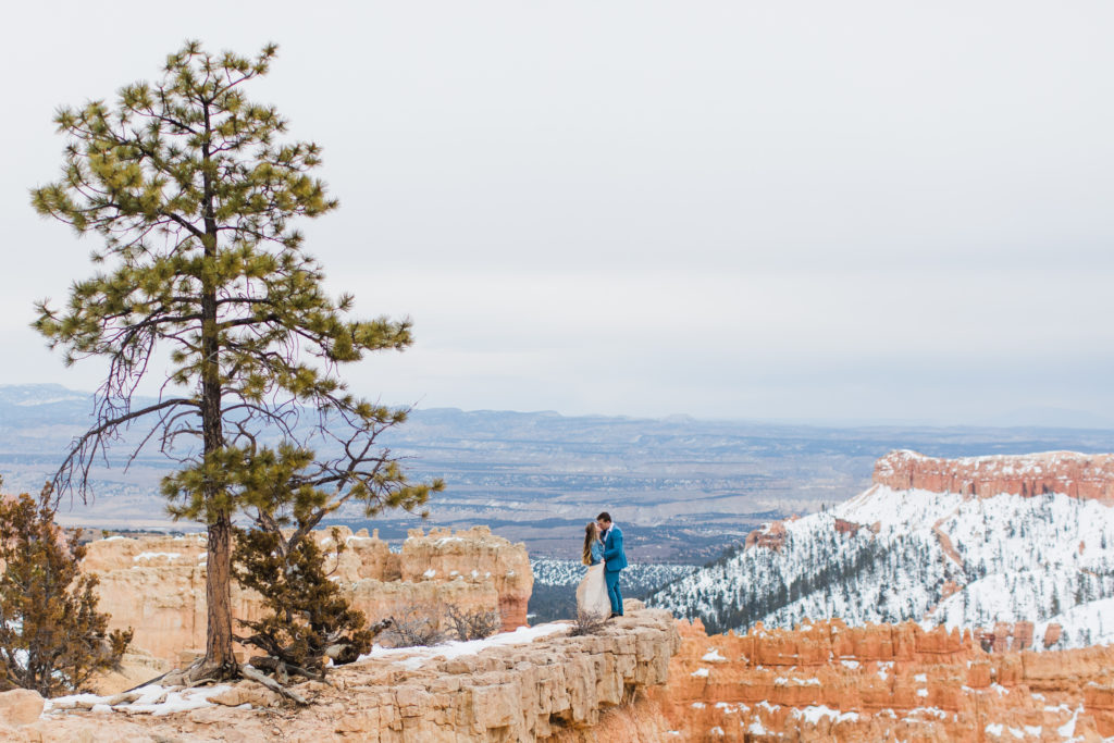 Landscape with a couple eloping at bryce canyon